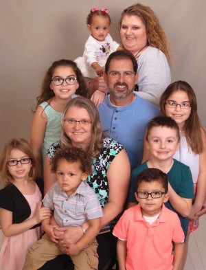 Leal with husband Raymond III and her eight grandchildren